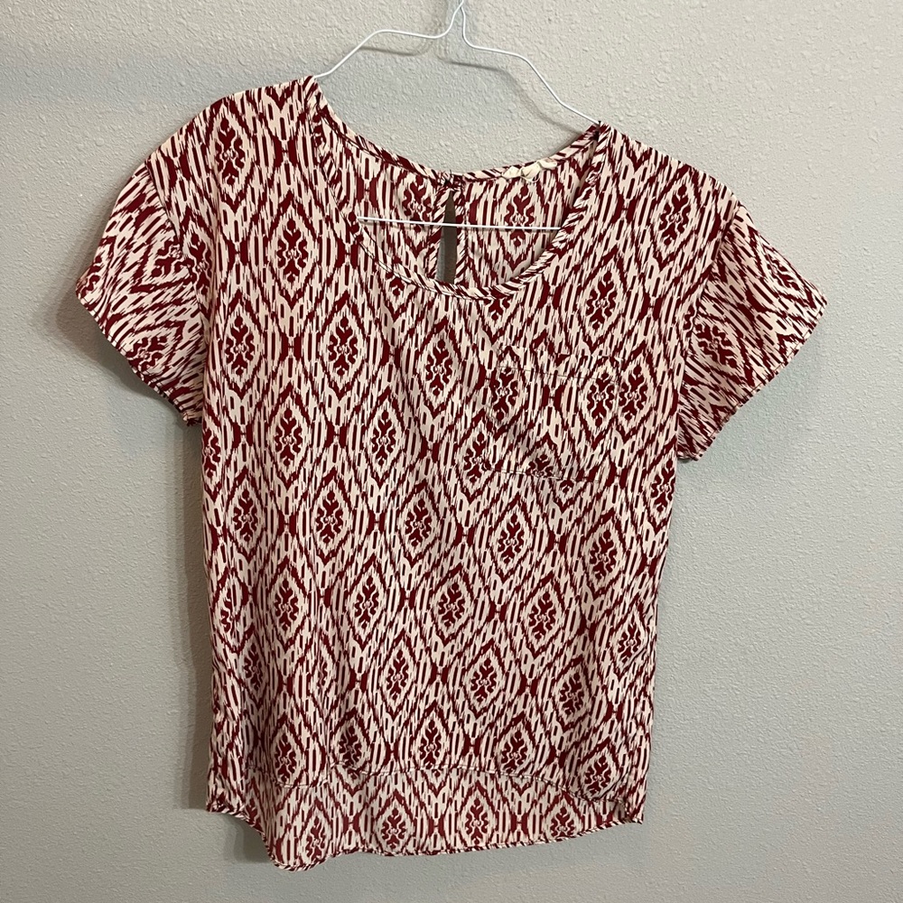 Red and White patterned blouse. Perfect to dress up or down!